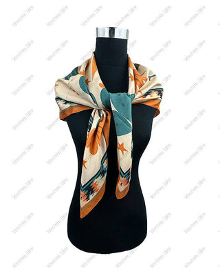 Colorful scarf on a black mannequin against a white background