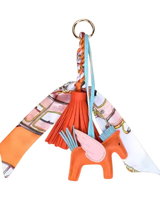 Decorative keychain with colorful design on a white background