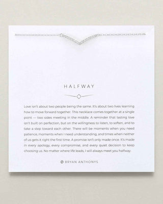 A silver half-way necklace displayed on a white card with a quote about halfway relationships. The brand name 'Bryan Anthony's' is visible at the bottom of the card.