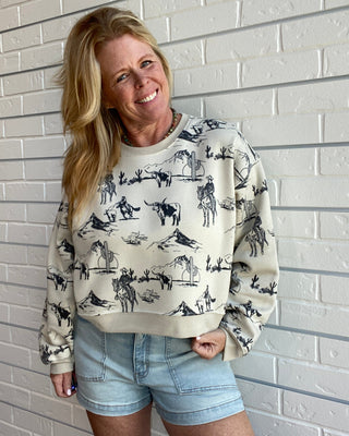 soft sponge fleece sweatshirt with a relaxed boxy fit and western-inspired graphic
