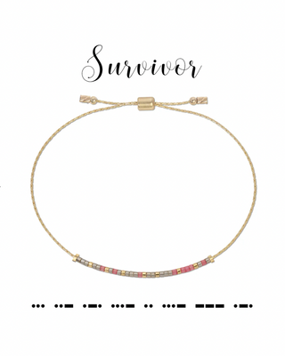 Gold bracelet with colorful beads on a white background, featuring the word 'Survivor' in morse code