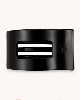 Black hair clip with on a white background