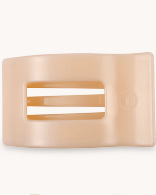 Beige rectangular soap dish with a central cutout on a white background