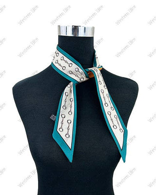 A white silk scarf with a teal border and a black chain-link pattern, styled on a black mannequin torso against a white background with diagonal watermarks.