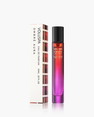 Voluspa Ombre Aura perfume bottle with gradient design on a white background
