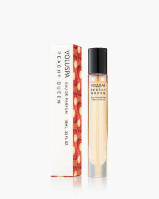 Voluspa Peachy Queen perfume bottle with packaging on a white background