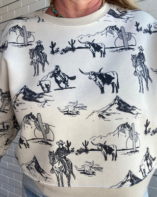 soft sponge fleece sweatshirt with a relaxed boxy fit and western-inspired graphic.