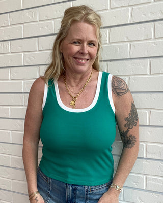 green ribbed tank top with white trim