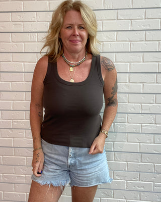 women wearing a fitted brown tank top