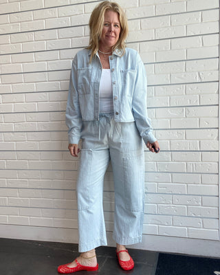 Women's matching railroad stripe denim jacket and carpenter pants set in lightweight ultra-soft cotton denim outfit